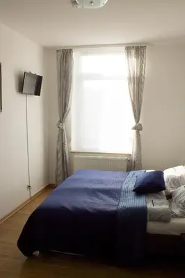 Ein Bett oder Betten in einem Zimmer der Unterkunft Ferienwohnung Ohligs