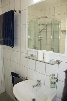 Ein Badezimmer in der Unterkunft Ferienwohnung Ohligs