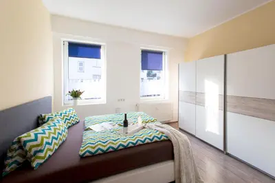 Ein Bett oder Betten in einem Zimmer der Unterkunft Neanderappartement