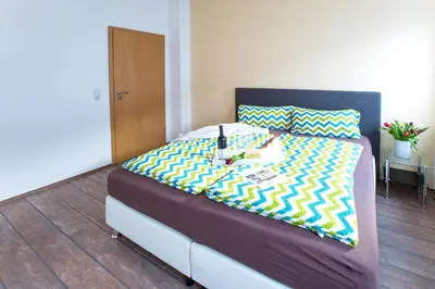 Ein Bett oder Betten in einem Zimmer der Unterkunft Neanderappartement