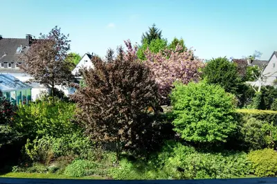Ein Garten an der Unterkunft Messeapartment Sunny Side