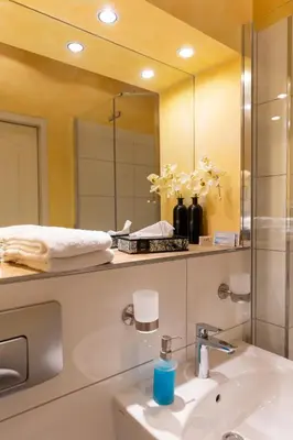 Ein Badezimmer in der Unterkunft Hotel Landhaus Knappmann