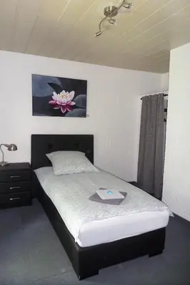 Ein Bett oder Betten in einem Zimmer der Unterkunft Haus Gerry
