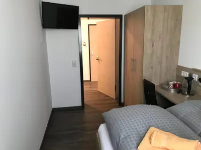 Ein Bett oder Betten in einem Zimmer der Unterkunft Kraftwerk Relax Motel