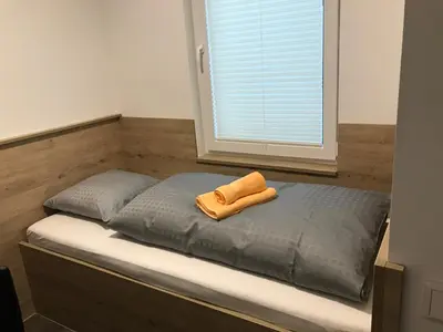 Ein Bett oder Betten in einem Zimmer der Unterkunft Kraftwerk Relax Motel