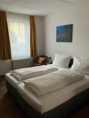 Ein Bett oder Betten in einem Zimmer der Unterkunft Paciello Restaurant Hotel