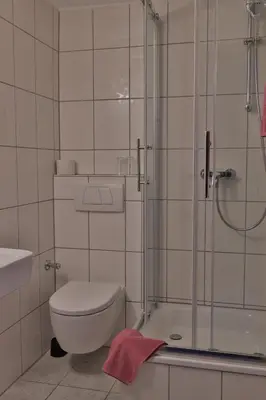 Ein Badezimmer in der Unterkunft Ilvericher Hof