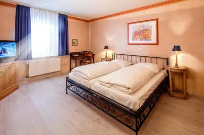 Ein Bett oder Betten in einem Zimmer der Unterkunft Hotel La Scala