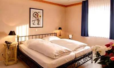 Ein Bett oder Betten in einem Zimmer der Unterkunft Hotel La Scala