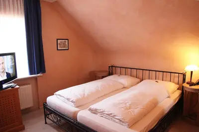 Ein Bett oder Betten in einem Zimmer der Unterkunft Hotel La Scala