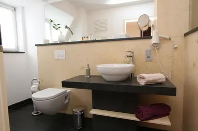 Ein Badezimmer in der Unterkunft Designhotel Im Südfeld