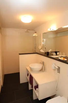 Ein Badezimmer in der Unterkunft Designhotel Im Südfeld