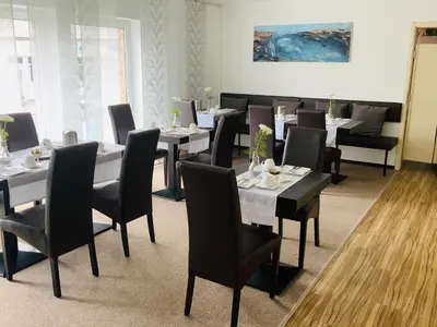 Ein Sitzbereich in der Unterkunft Designhotel Im Südfeld