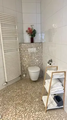 Ein Badezimmer in der Unterkunft Hotel Victoria