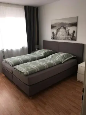 Ein Bett oder Betten in einem Zimmer der Unterkunft Apartment Jakimovski