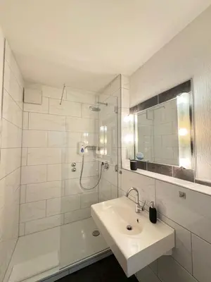 Ein Badezimmer in der Unterkunft Hotel Biedermeier