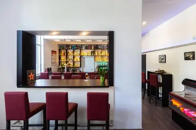 Ein Sitzbereich in der Unterkunft Ruhr Inn Hotel