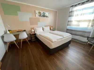 Ein Bett oder Betten in einem Zimmer der Unterkunft Residenz Hotel Wuppertal