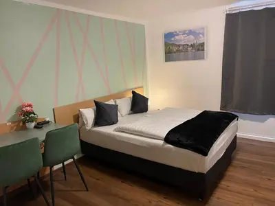 Ein Bett oder Betten in einem Zimmer der Unterkunft Residenz Hotel Wuppertal