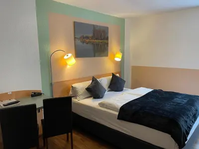 Ein Bett oder Betten in einem Zimmer der Unterkunft Residenz Hotel Wuppertal