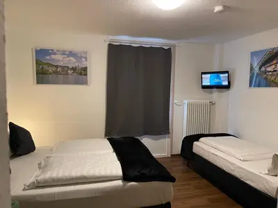 Ein Bett oder Betten in einem Zimmer der Unterkunft Residenz Hotel Wuppertal