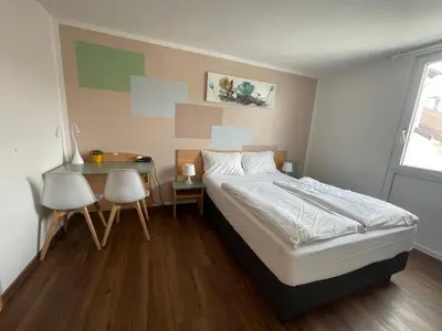 Ein Bett oder Betten in einem Zimmer der Unterkunft Residenz Hotel Wuppertal