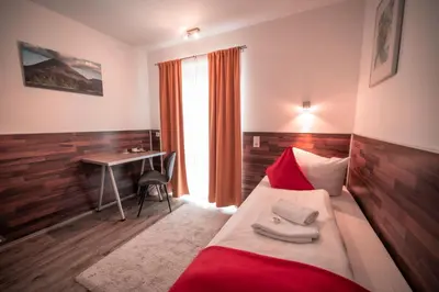 Ein Bett oder Betten in einem Zimmer der Unterkunft SSC Sport+Seminarcenter Radevormwald