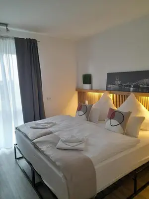 Ein Bett oder Betten in einem Zimmer der Unterkunft SSC Sport+Seminarcenter Radevormwald
