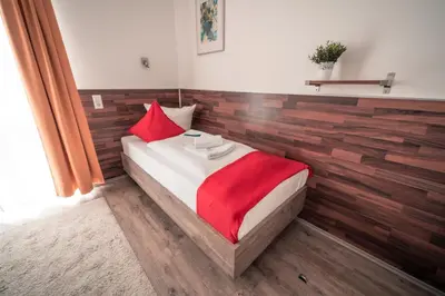 Ein Bett oder Betten in einem Zimmer der Unterkunft SSC Sport+Seminarcenter Radevormwald