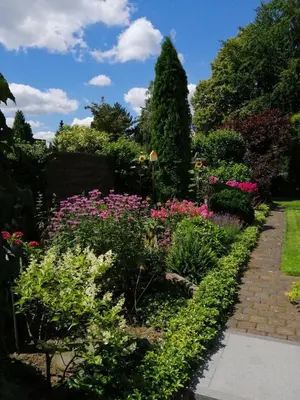 Ein Garten an der Unterkunft ElHa's FeWo