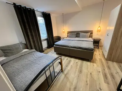 Ein Bett oder Betten in einem Zimmer der Unterkunft Pension-Sendis