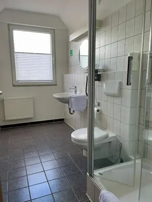Ein Badezimmer in der Unterkunft Haus Fliederbusch
