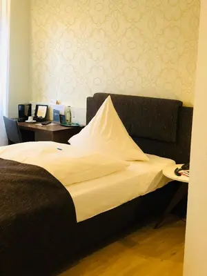 Ein Bett oder Betten in einem Zimmer der Unterkunft Haus Fliederbusch
