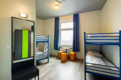 Ein Bett oder Betten in einem Zimmer der Unterkunft a&o Dortmund Hauptbahnhof