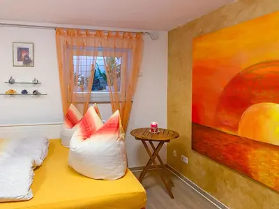 Ein Bett oder Betten in einem Zimmer der Unterkunft Neanderland-Apartment