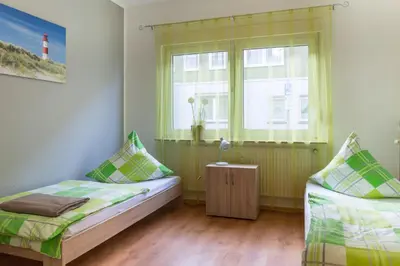 Ein Bett oder Betten in einem Zimmer der Unterkunft Apartment Wideystrasse