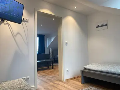 Ein Bett oder Betten in einem Zimmer der Unterkunft Zimmervermietung Lösken