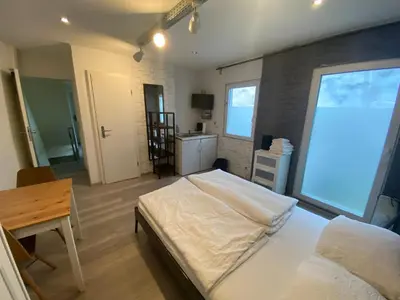 Ein Bett oder Betten in einem Zimmer der Unterkunft Altstadt Düsseldorf 1