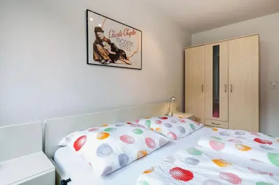 Ein Bett oder Betten in einem Zimmer der Unterkunft Altstadt Kunstmuseum