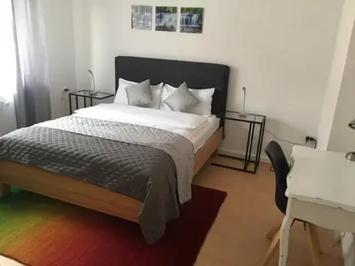 Ein Bett oder Betten in einem Zimmer der Unterkunft A&H Apartment