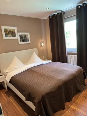 Ein Bett oder Betten in einem Zimmer der Unterkunft Pension am Zollverein
