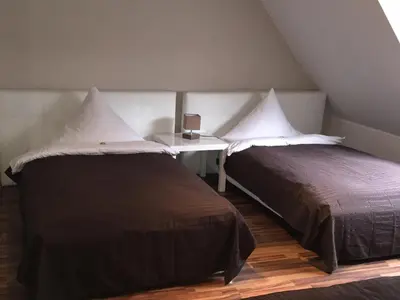 Ein Bett oder Betten in einem Zimmer der Unterkunft Pension am Zollverein