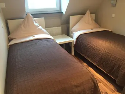 Ein Bett oder Betten in einem Zimmer der Unterkunft Pension am Zollverein