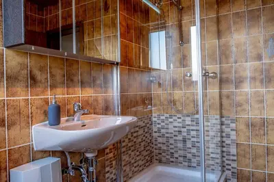 Ein Badezimmer in der Unterkunft Helles Appartement mit eigenem Stellplatz