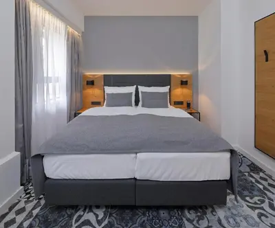 Ein Bett oder Betten in einem Zimmer der Unterkunft Coffee Fellows Hotel Dortmund