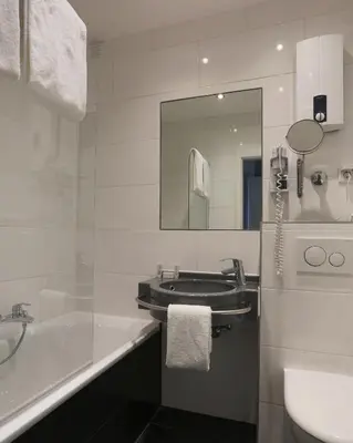 Ein Badezimmer in der Unterkunft Boardinghouse Düsseldorf