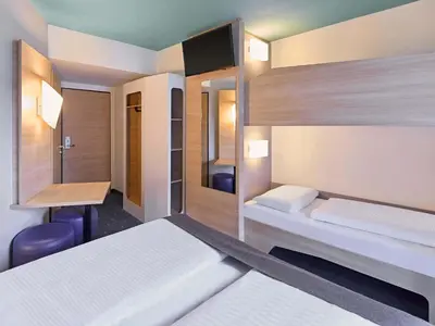 Ein Bett oder Betten in einem Zimmer der Unterkunft B&B Hotel Dortmund-City