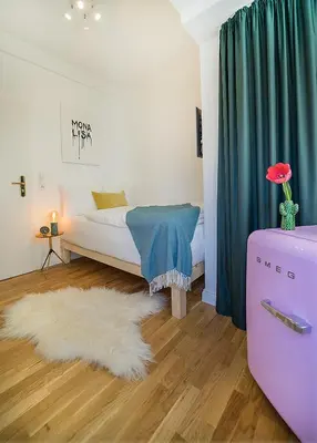 Ein Bett oder Betten in einem Zimmer der Unterkunft Victoria Altstadt Hotel