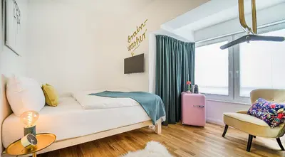 Ein Bett oder Betten in einem Zimmer der Unterkunft Victoria Altstadt Hotel