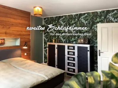Ein Bett oder Betten in einem Zimmer der Unterkunft Wohnungen mit Balkon, 2 Schlafzimmer, nahe Centro & Arena